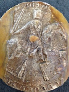 The reverse of Alexander III's Great Seal - showing the king as a mounted knight with sword in hand